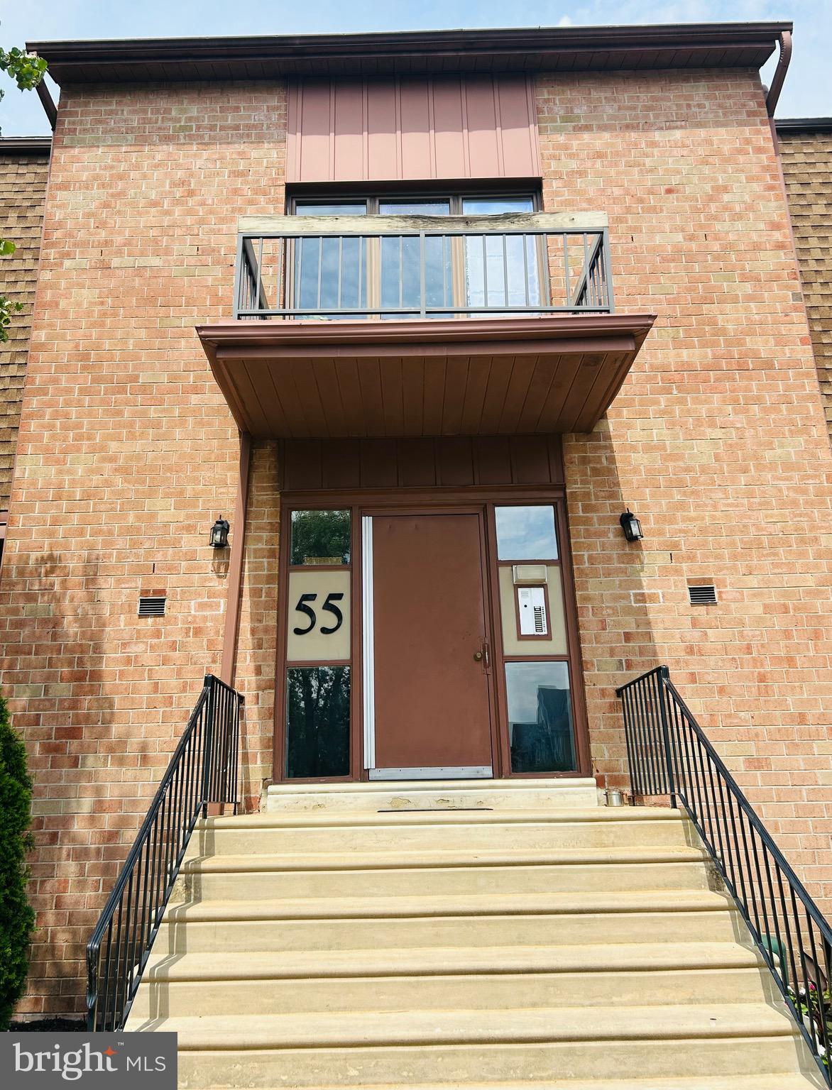 55301 Delaire Landing Road, Unit 301 Philadelphia, PA 19114 - Photo 4 of 7 a view of a brick house with wooden floor and windows