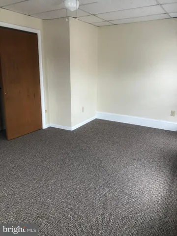 a bathroom with a toilet and a sink