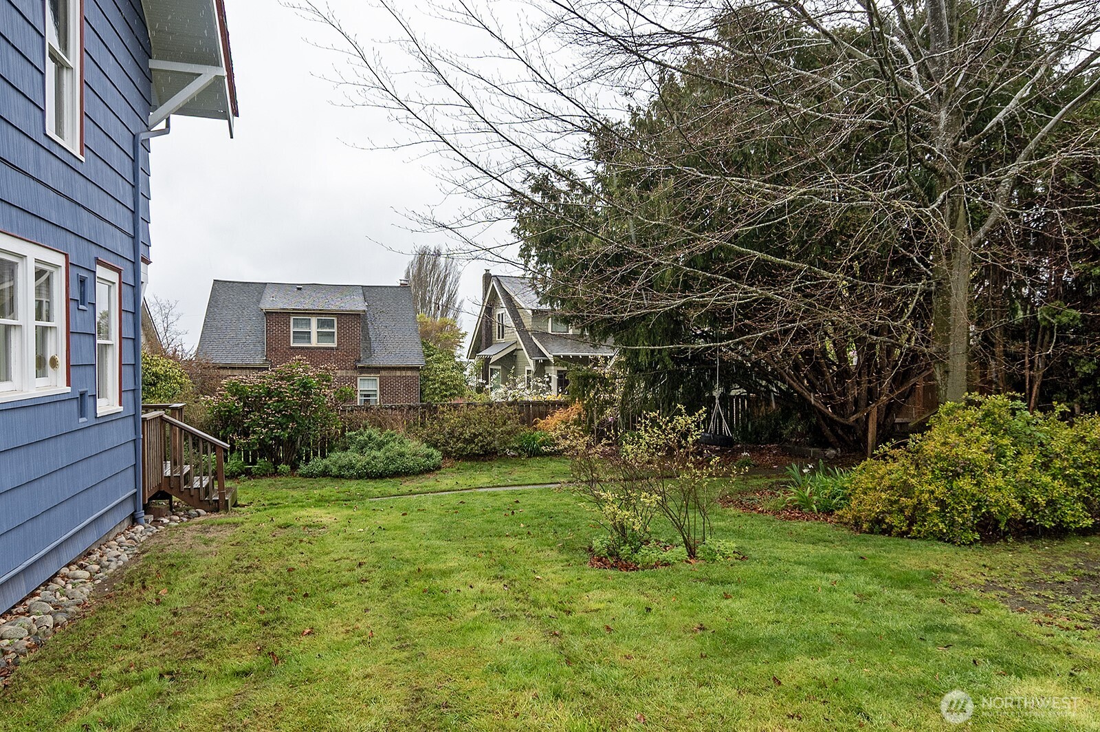3244 Northwest 64th Street Seattle, WA 98107 - Photo 4 of 32 a view of backyard of house with green space