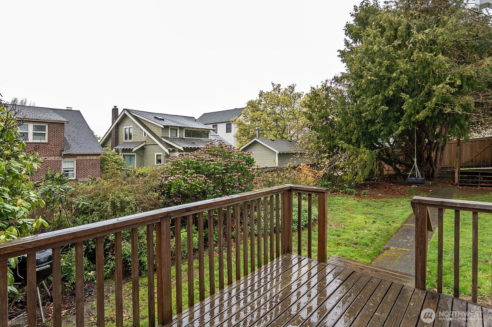 3244 Northwest 64th Street Seattle, WA 98107 - Photo 6 of 32 a view of a wooden deck and a garden