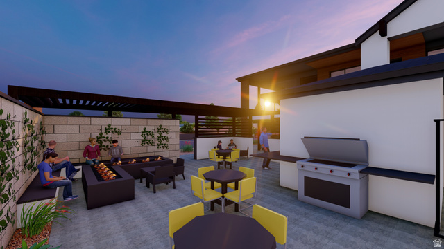 245 Red Cliffs Drive, Unit 104 St. George, UT 84790 - Photo 33 of 33 Patio terrace at dusk with a fire pit, a patio, an outdoor living / dining area, and a pergola