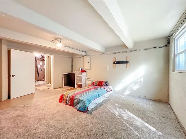 an aerial view of a houses with a lake view