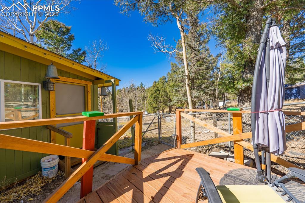 374 Fern Road Woodland Park, CO 80863 - Photo 3 of 31 a view of house with a swimming pool