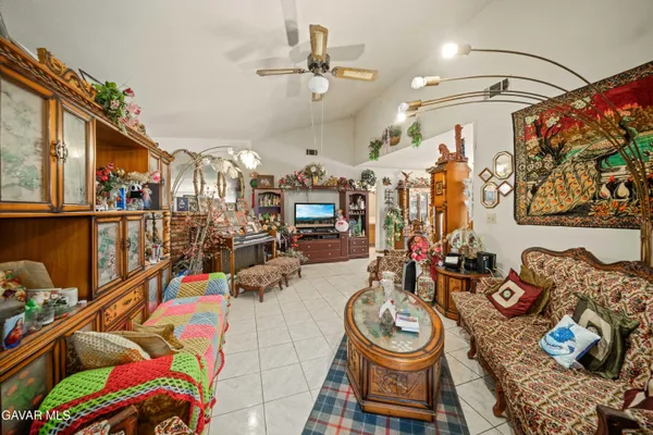 a room with lots of furniture and rug