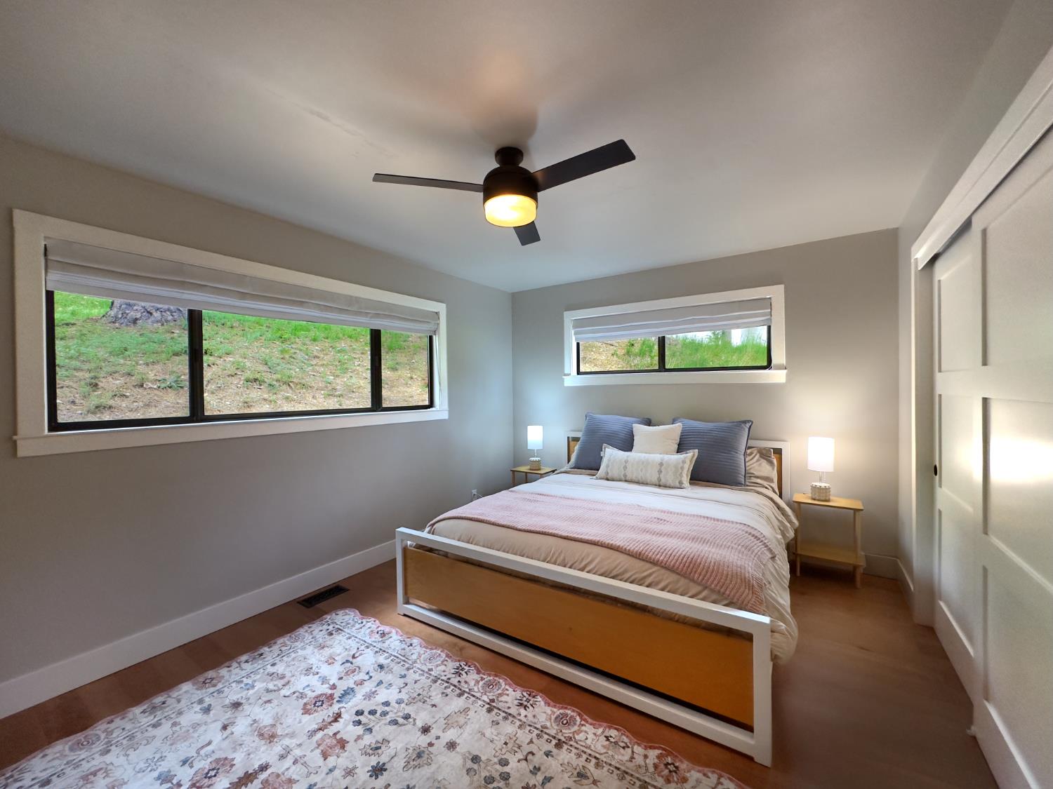 157 Grove Street Nevada City, CA 95959 - Photo 14 of 55 a bedroom with a bed and a window