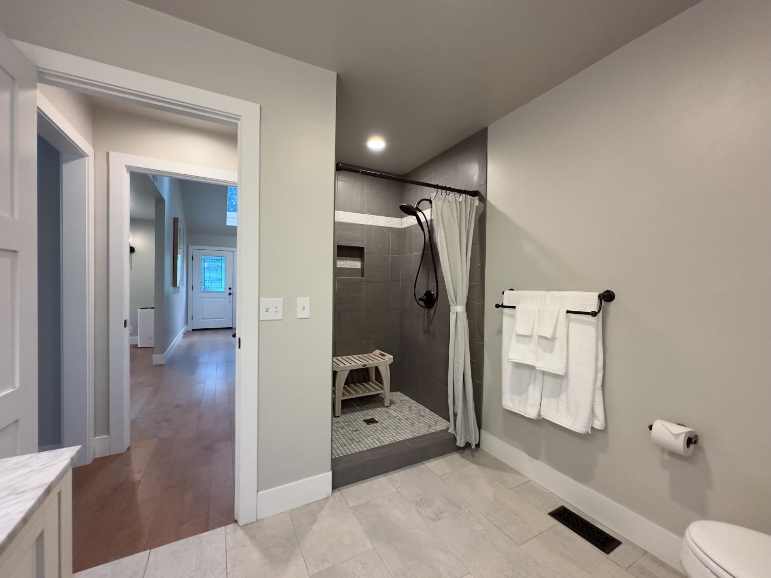 157 Grove Street Nevada City, CA 95959 - Photo 32 of 55 a bathroom with a shower and toilet