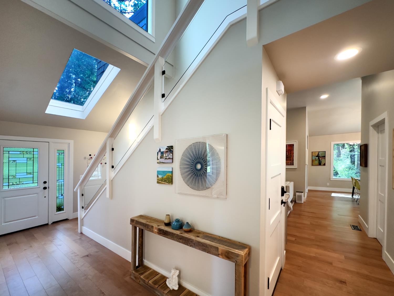 157 Grove Street Nevada City, CA 95959 - Photo 34 of 55 a hallway with wooden floor and furniture
