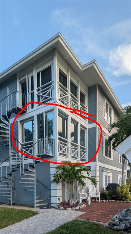 1546 Stickney Point Road, Unit 501 Sarasota, FL 34231 - Photo 2 of 34 a front view of building with street