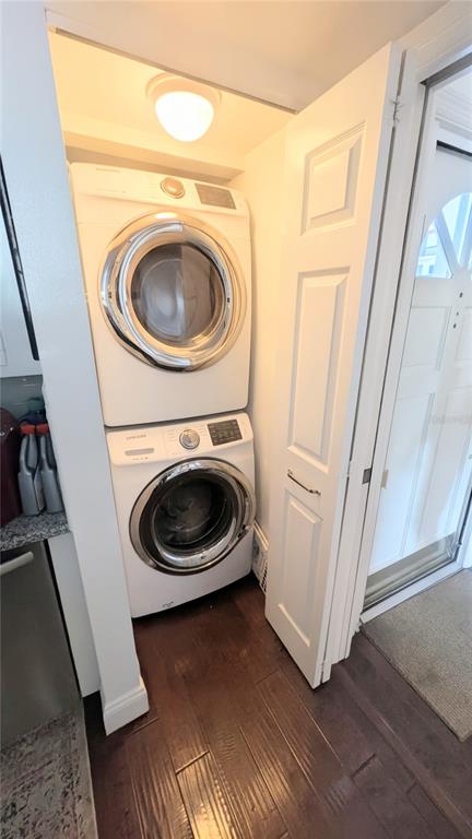 1546 Stickney Point Road, Unit 501 Sarasota, FL 34231 - Photo 31 of 34 a view of a hallway with washer and dryer