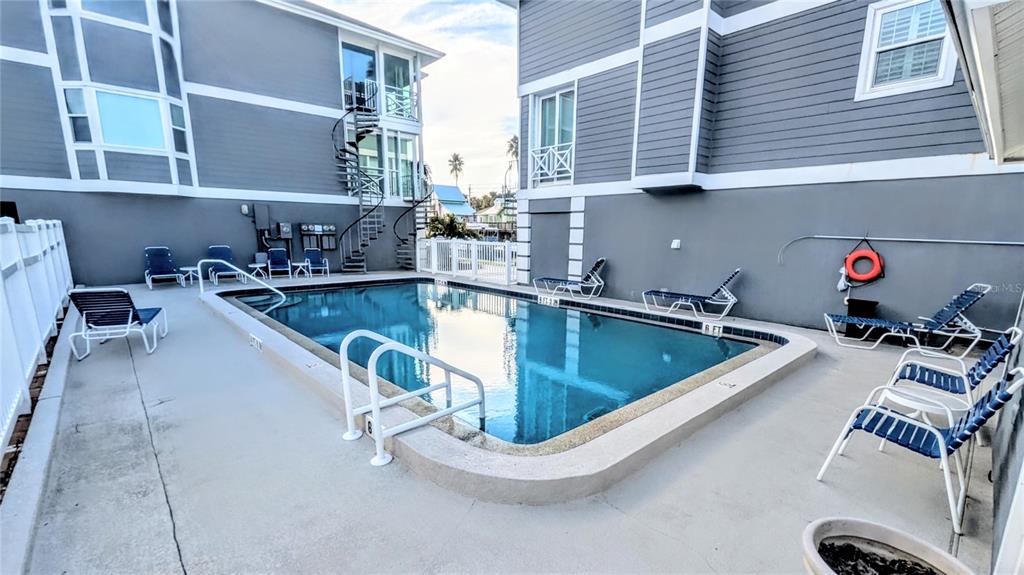 1546 Stickney Point Road, Unit 501 Sarasota, FL 34231 - Photo 32 of 34 a view of a kitchen with a sink and cabinets
