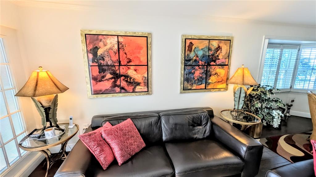 1546 Stickney Point Road, Unit 501 Sarasota, FL 34231 - Photo 6 of 34 a living room with furniture and a window