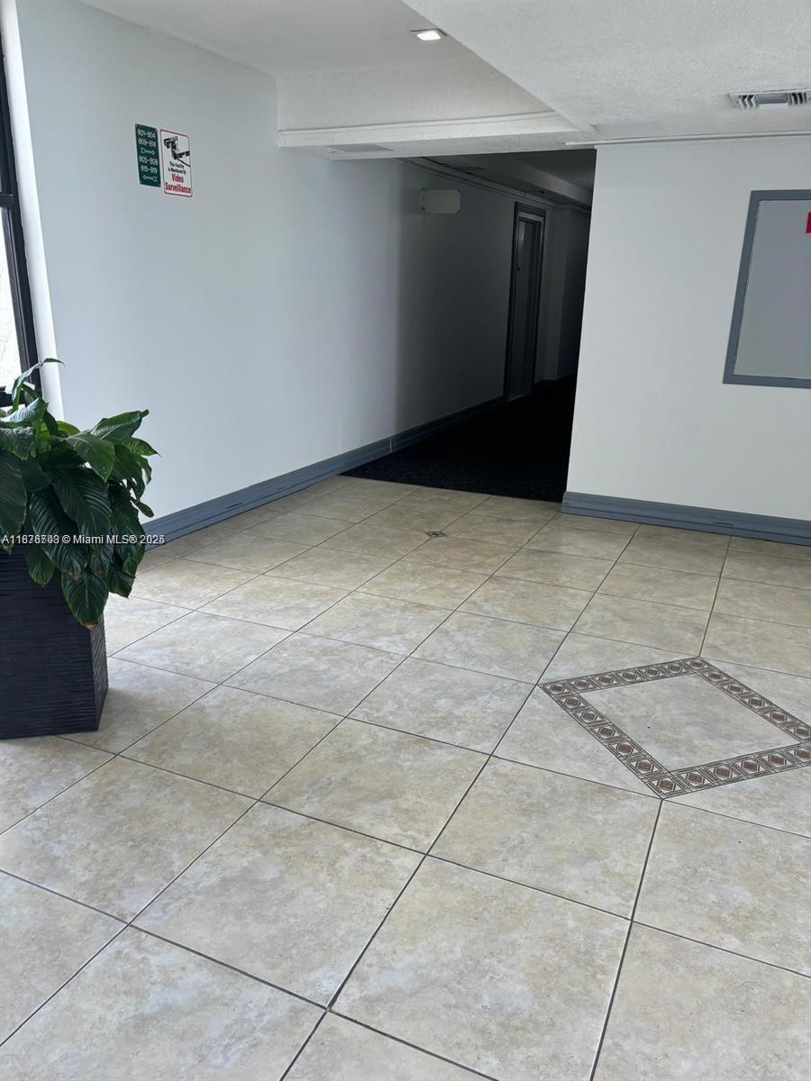 17011 North Bay Road, Unit 805 Sunny Isles Beach, FL 33160 - Photo 20 of 25 a view of an empty room with a window