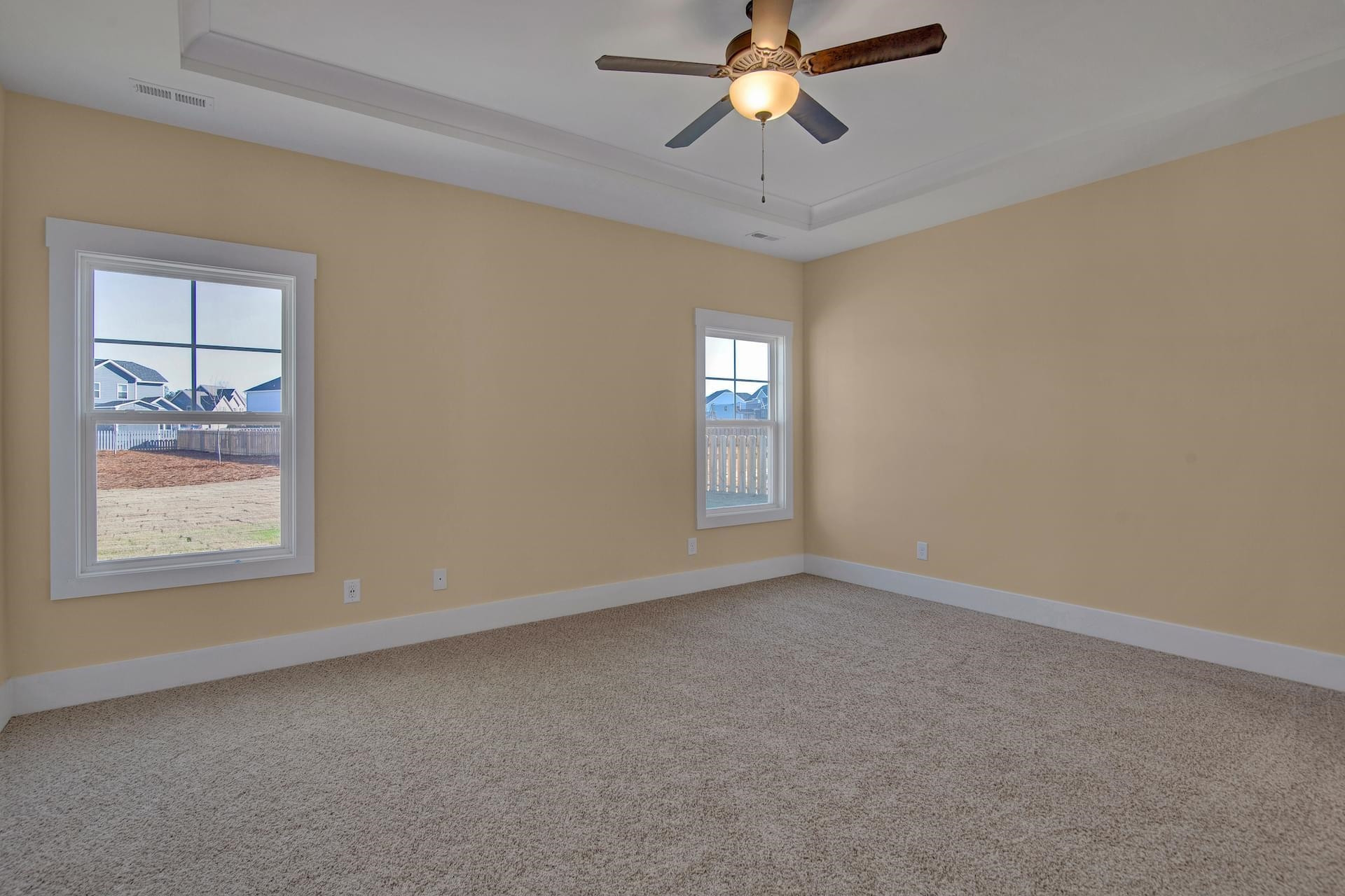 375 Howards Crossing Drive Wendell, NC 27591 - Photo 11 of 16 an empty room with windows and fan