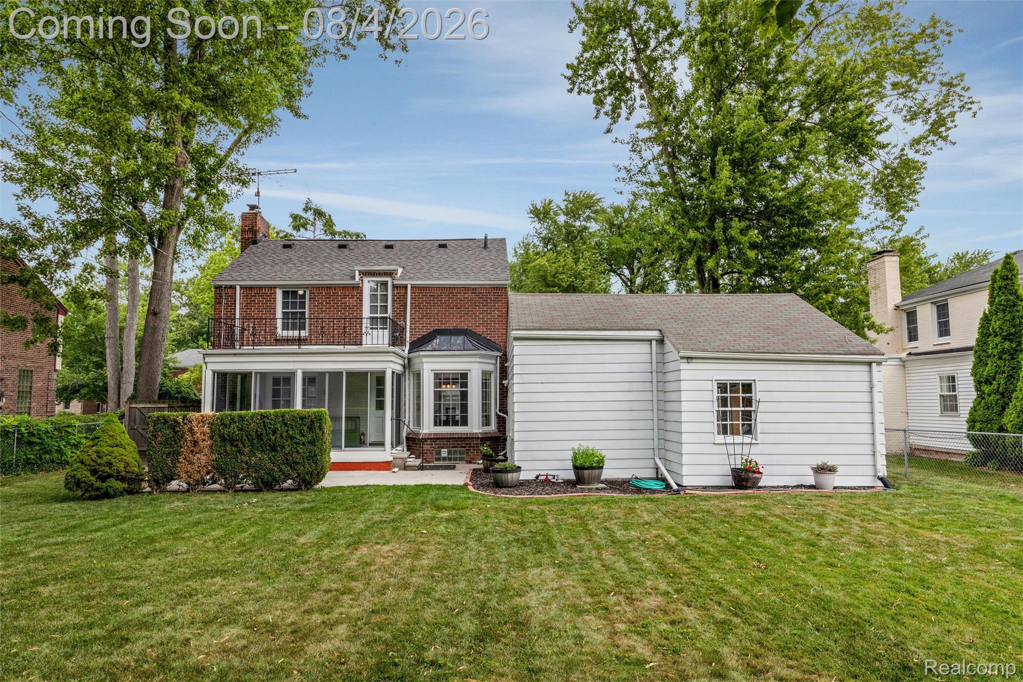 1729 Broadstone Road Grosse Pointe, MI 48236 - Photo 32 of 39 Expansive backyard featuring a manicured lawn
