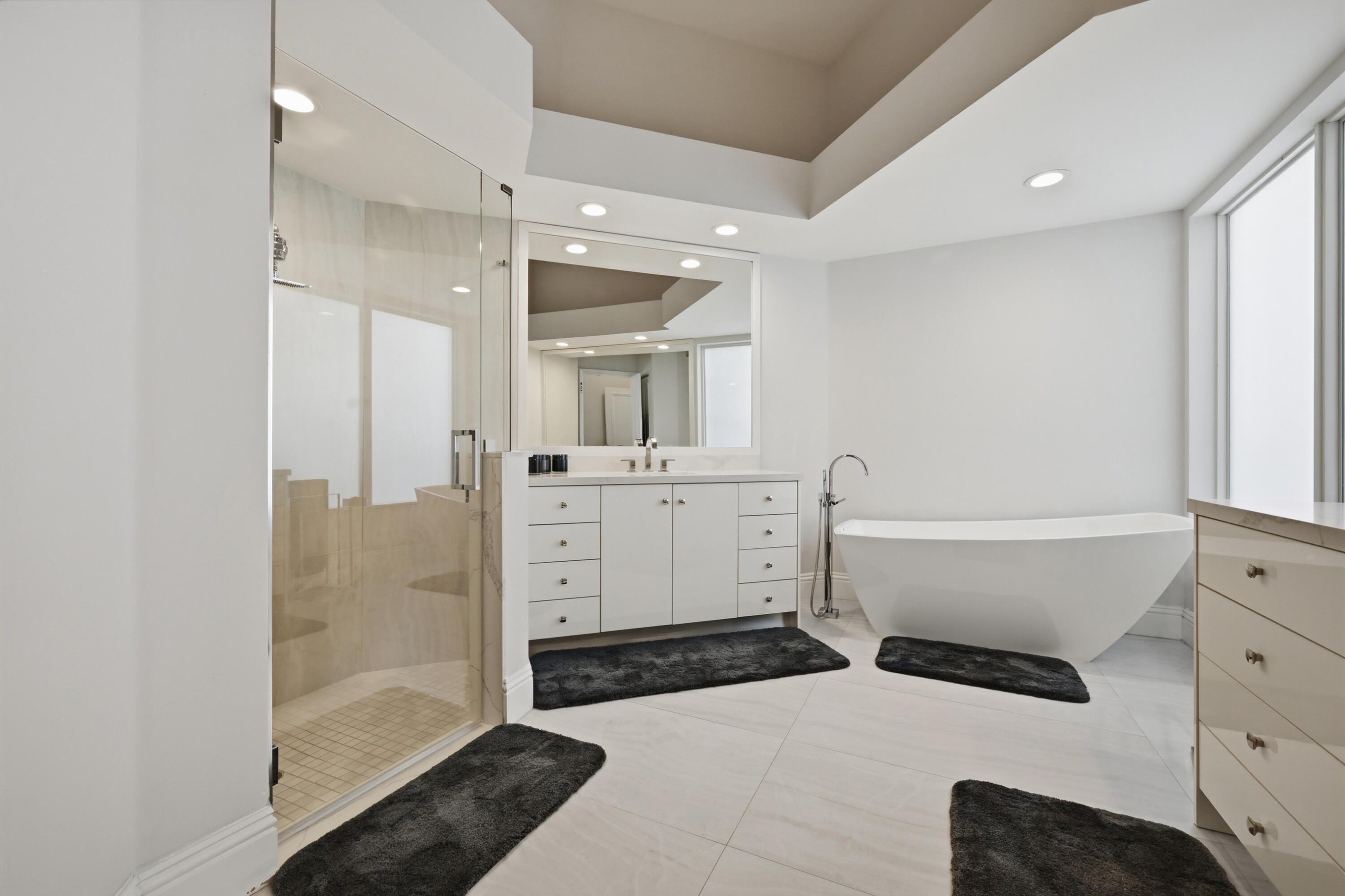 5006 Northwest 24th Circle Boca Raton, FL 33431 - Photo 24 of 52 a bathroom with a bathtub sink and mirror