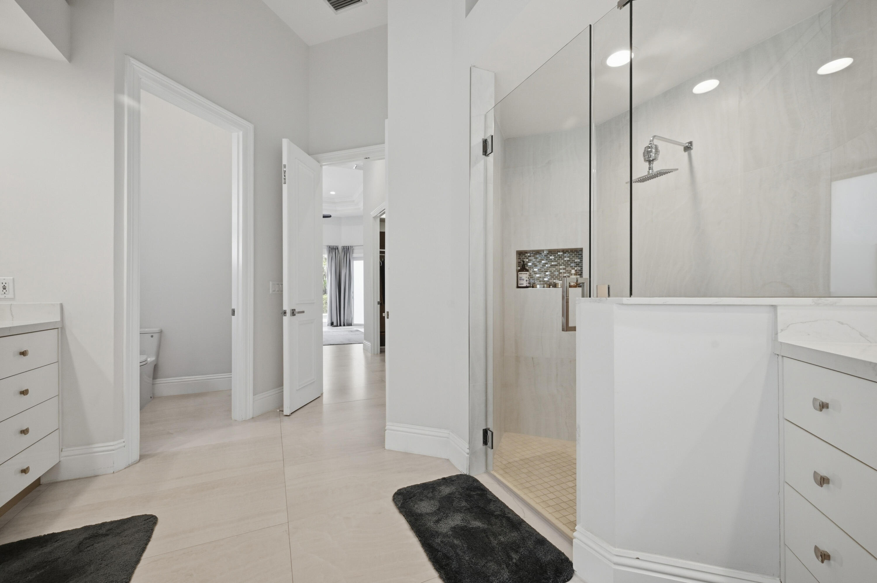 5006 Northwest 24th Circle Boca Raton, FL 33431 - Photo 25 of 52 a bathroom with a shower and a sink