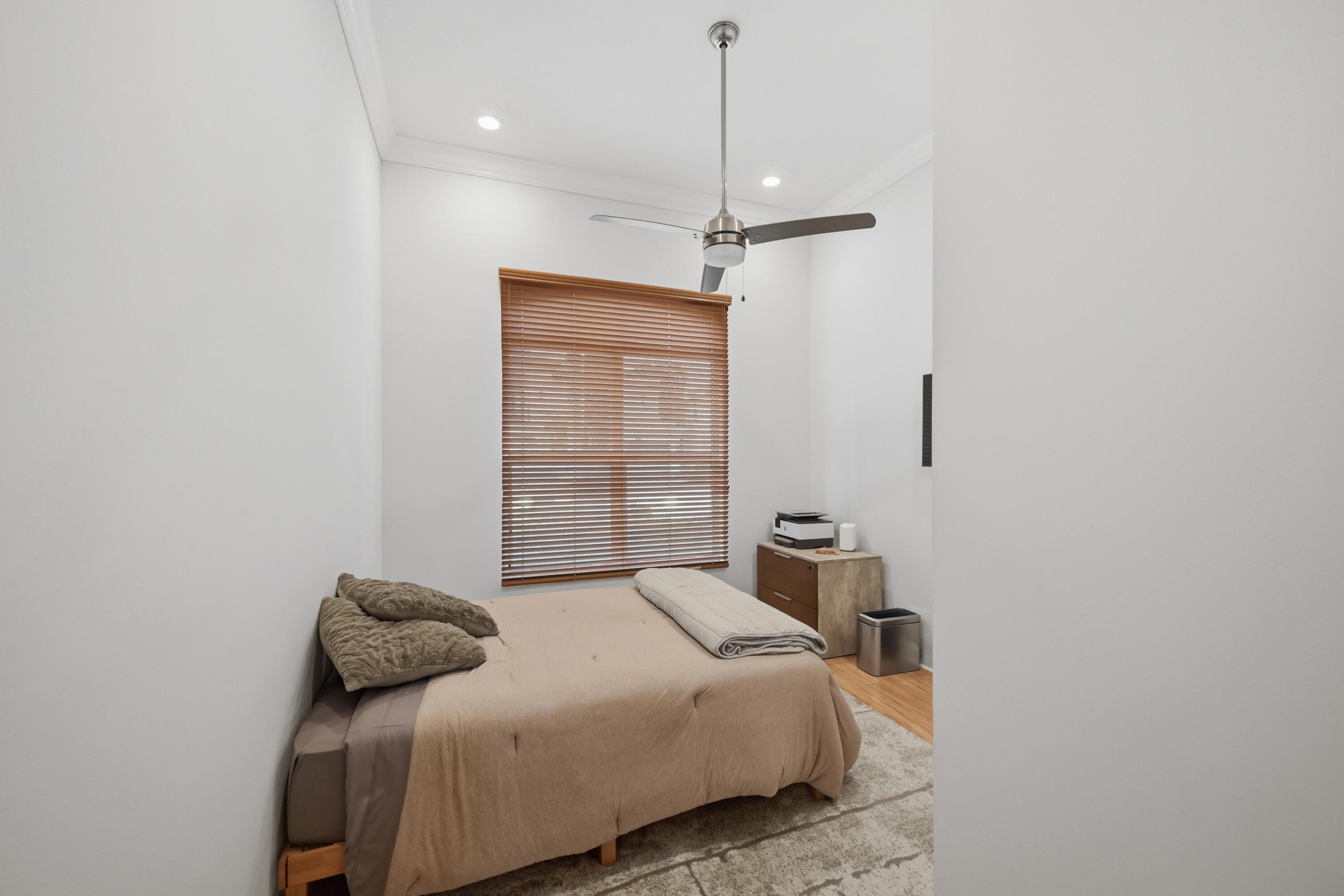 5006 Northwest 24th Circle Boca Raton, FL 33431 - Photo 29 of 52 a bedroom with a bed and a window