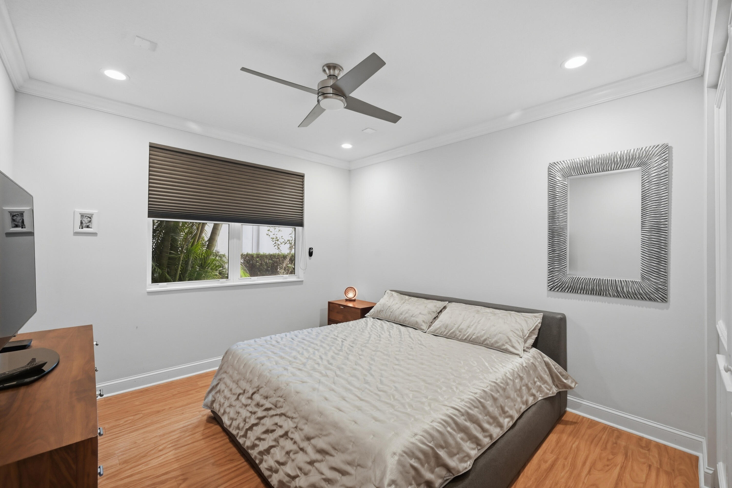 5006 Northwest 24th Circle Boca Raton, FL 33431 - Photo 31 of 52 a bedroom with a bed and a window