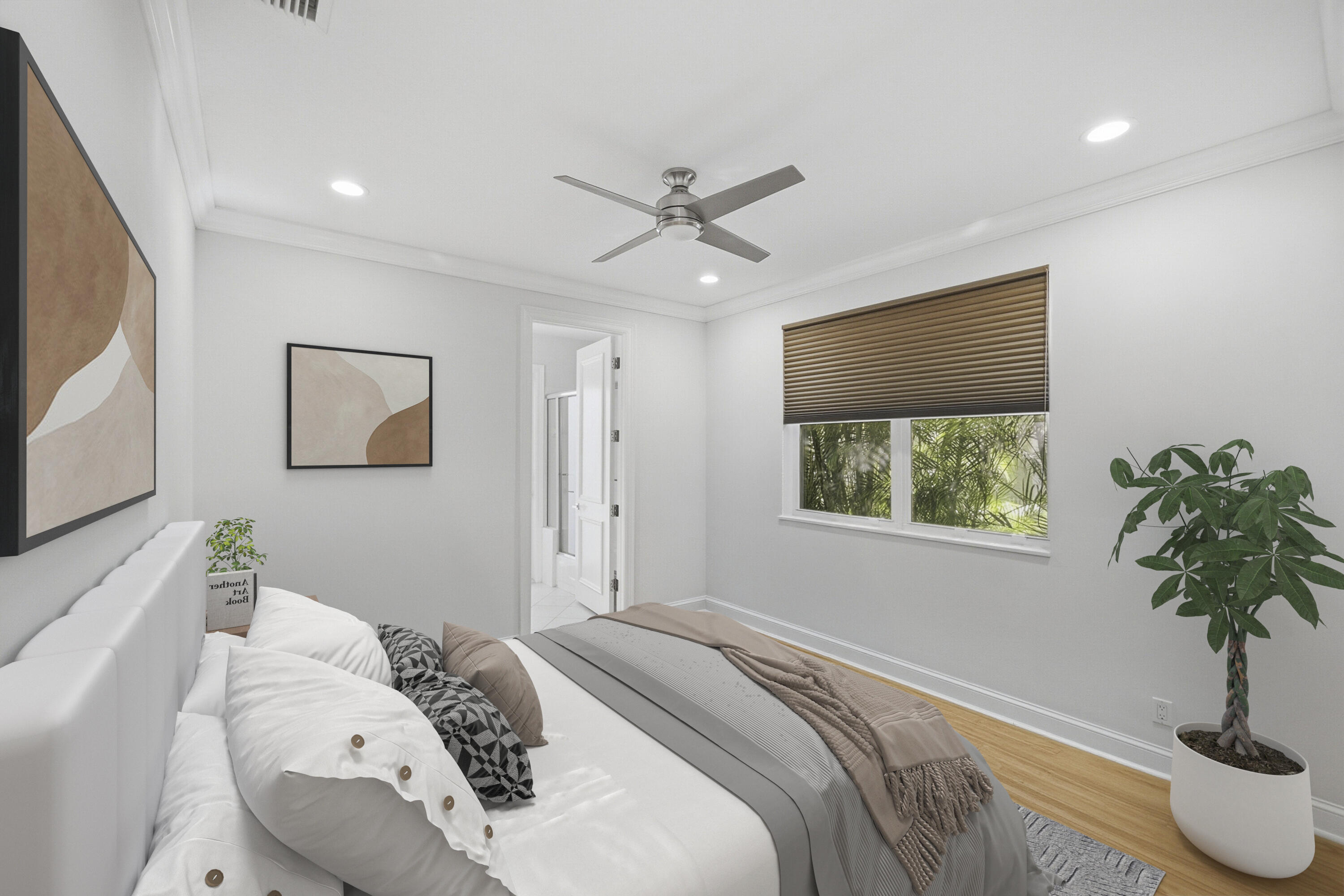 5006 Northwest 24th Circle Boca Raton, FL 33431 - Photo 34 of 52 a bedroom with a bed and a potted plant