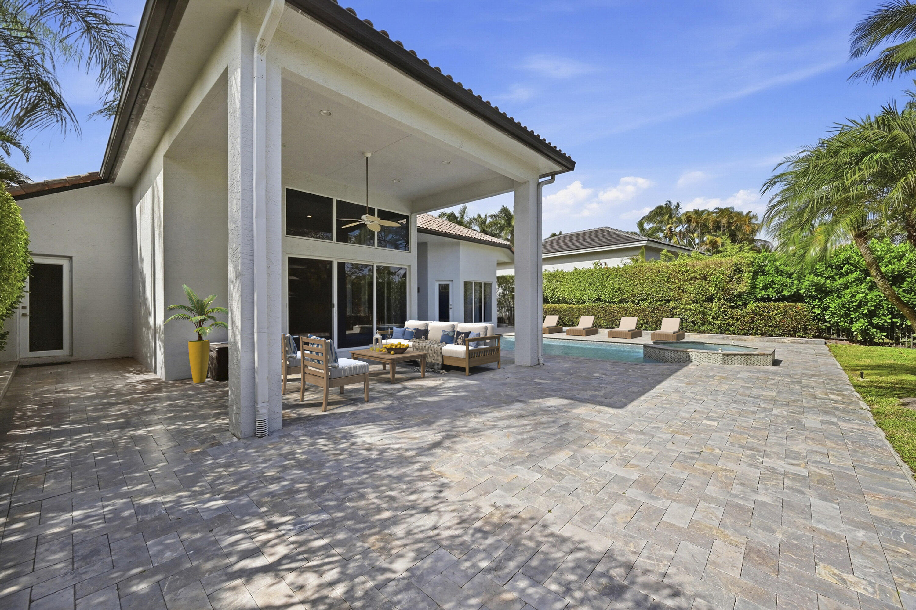 5006 Northwest 24th Circle Boca Raton, FL 33431 - Photo 37 of 52 a view of a house with backyard and porch