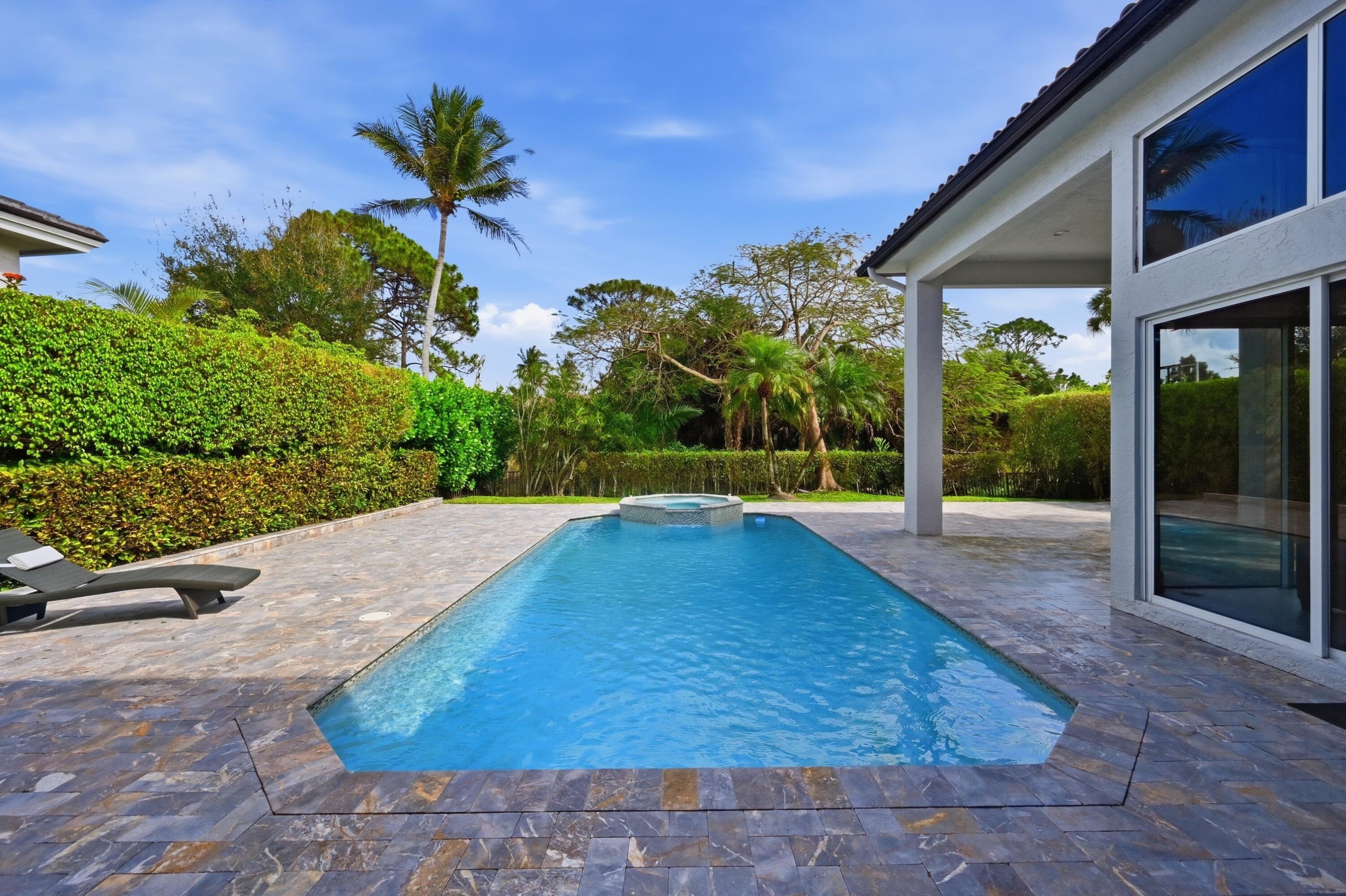 5006 Northwest 24th Circle Boca Raton, FL 33431 - Photo 39 of 52 a view of a backyard of a house