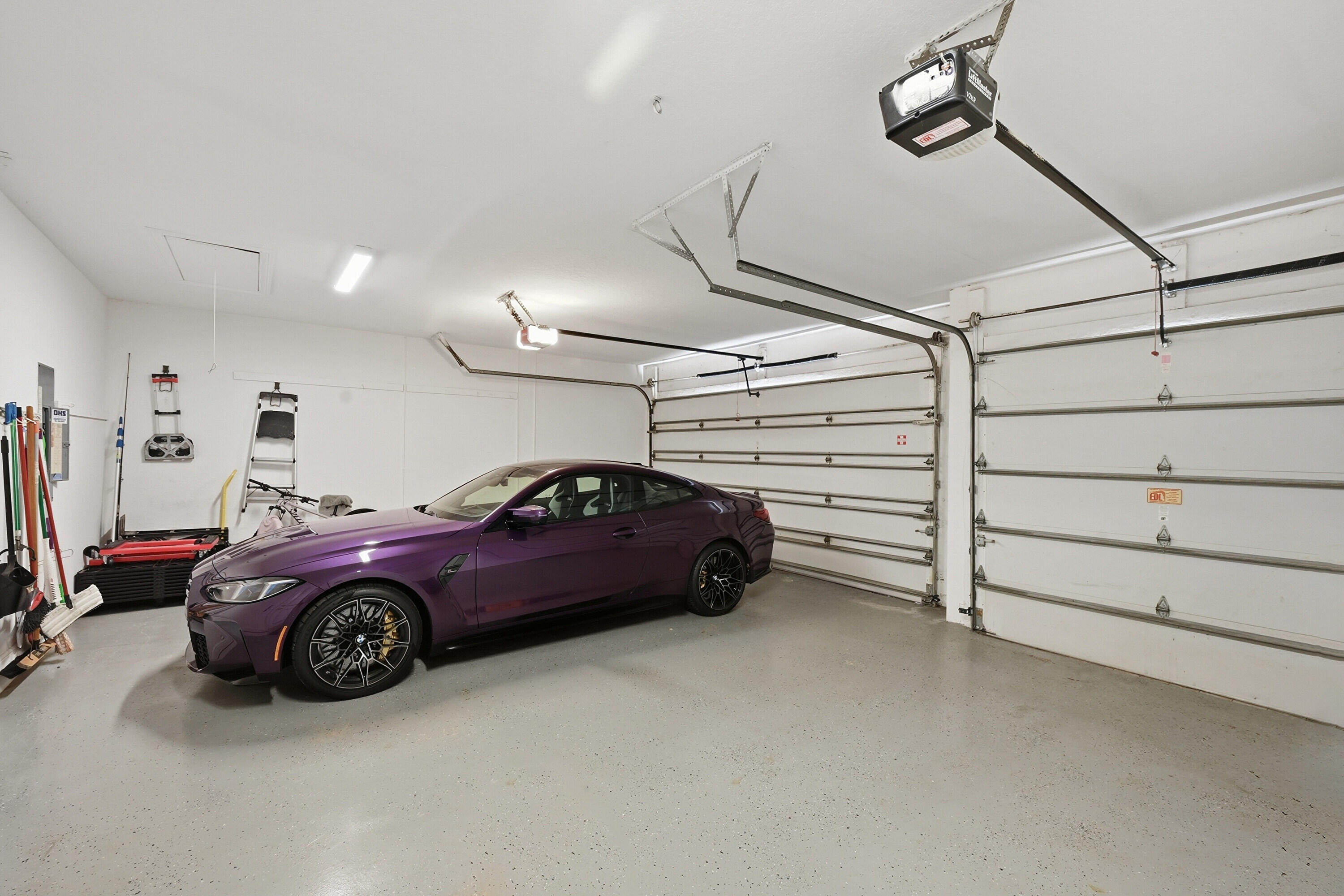 5006 Northwest 24th Circle Boca Raton, FL 33431 - Photo 41 of 52 a car parked in a garage