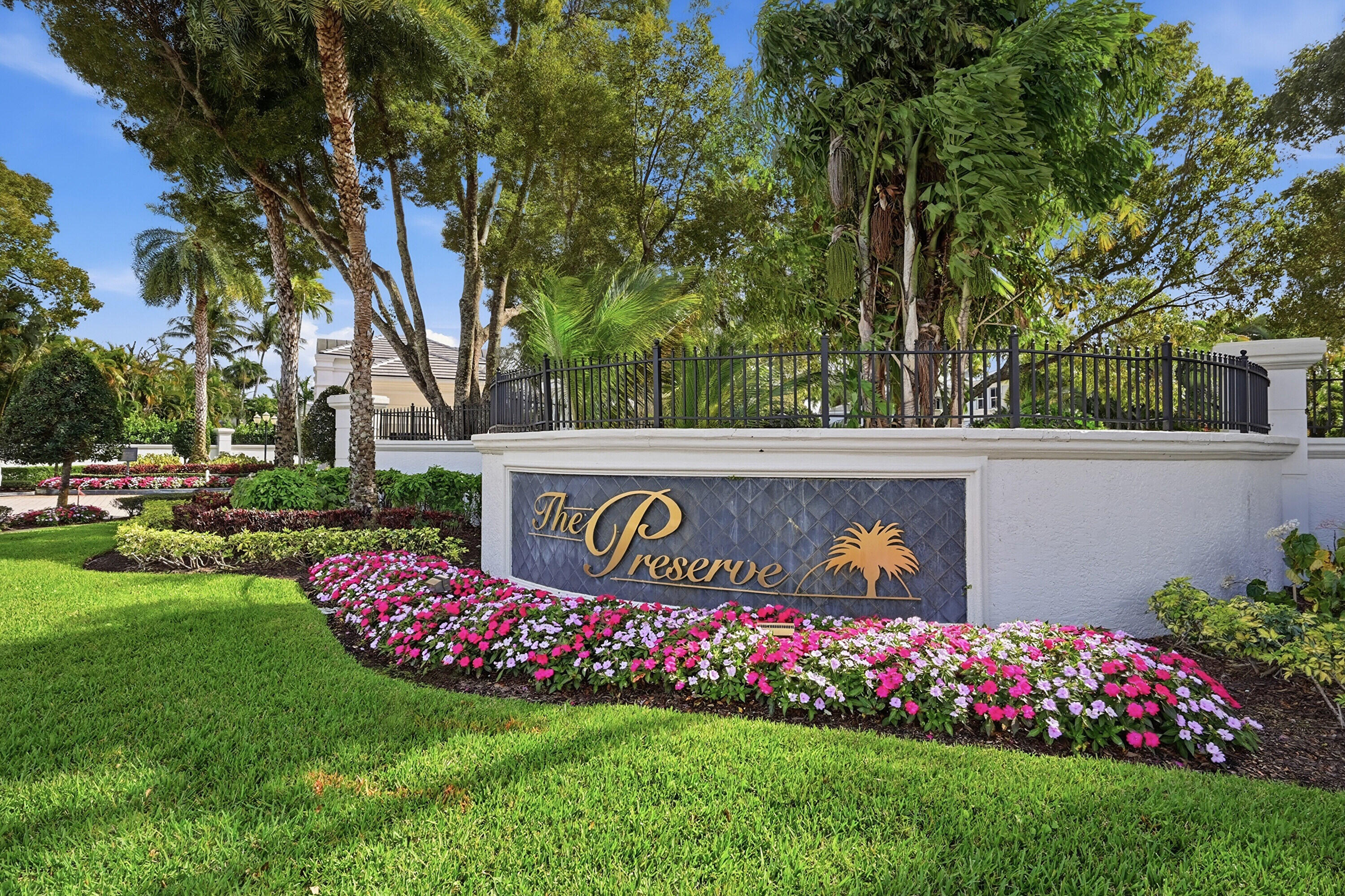 5006 Northwest 24th Circle Boca Raton, FL 33431 - Photo 42 of 52 a view of sign board with flower garden