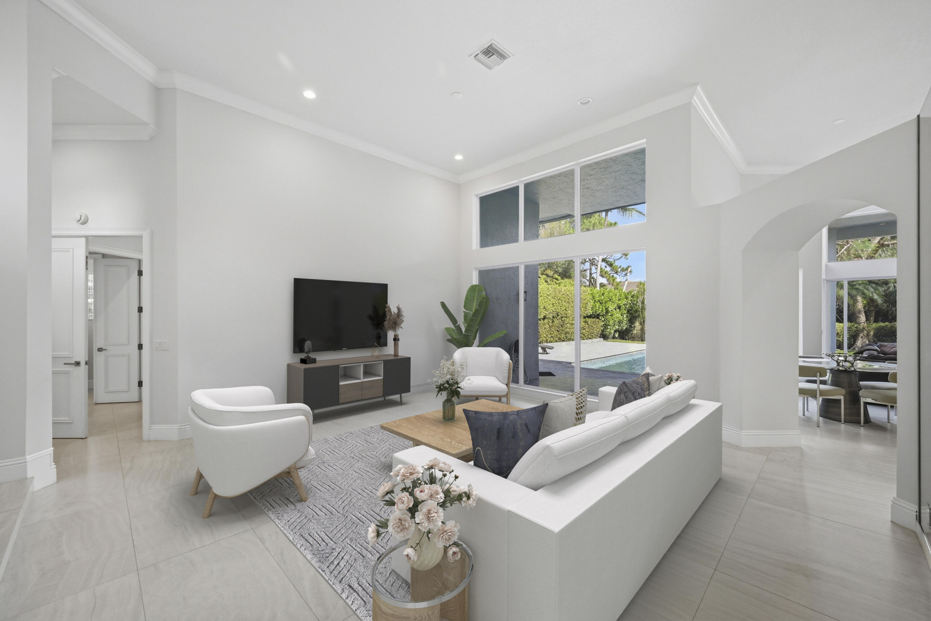 5006 Northwest 24th Circle Boca Raton, FL 33431 - Photo 5 of 52 a living room with furniture and a flat screen tv
