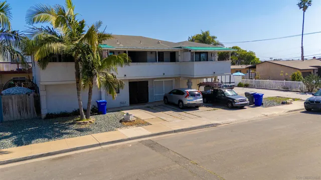 a car parked in front of a house