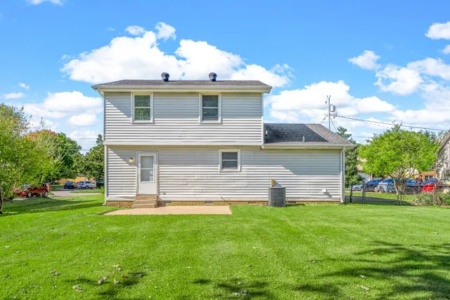 a view of a house with a big yard