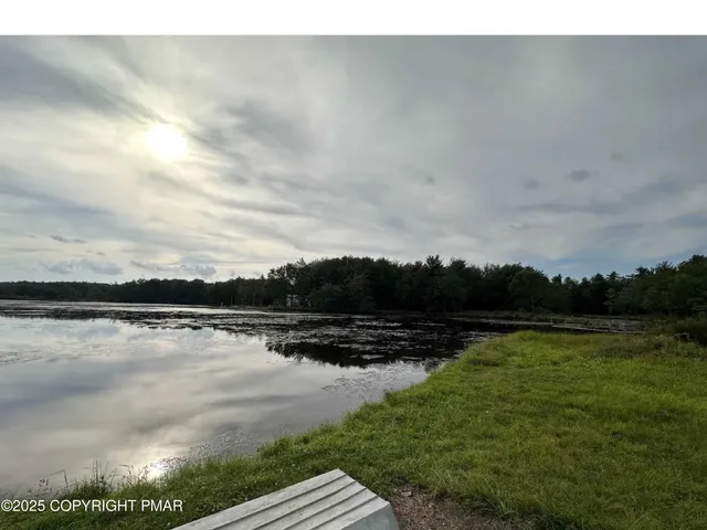 a view of outdoor space and lake view
