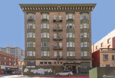 a front view of a building with glass windows