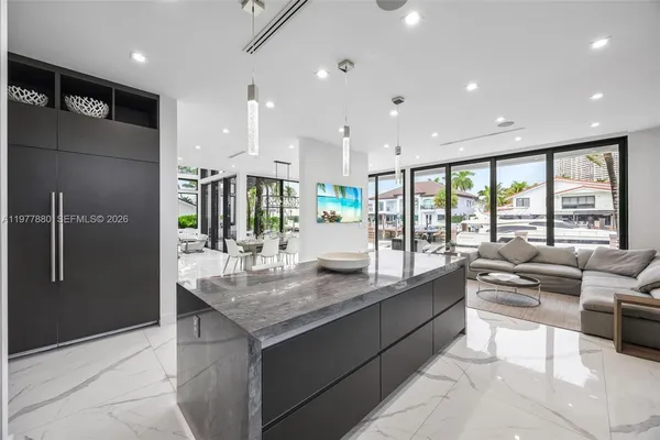 a bedroom with a bed and a chair