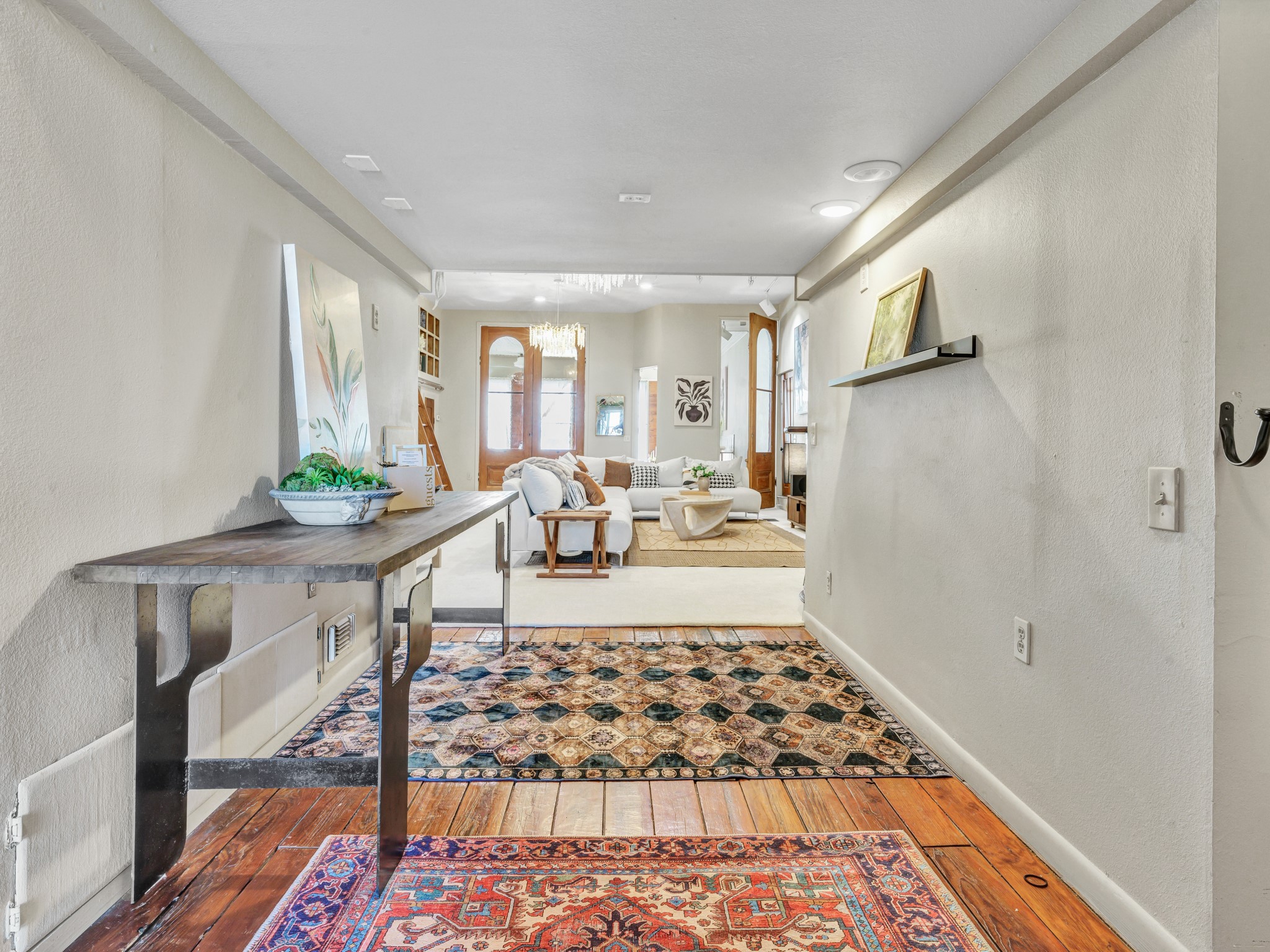 106 West Main Street Pilot Point, TX 76258 - Photo 23 of 46 a living room with a rug and a table