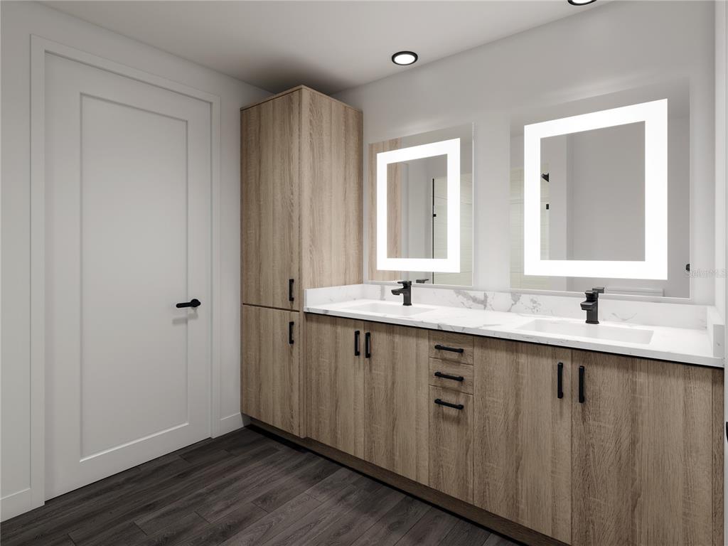 901 West Chestnut Street, Unit B507 Tampa, FL 33607 - Photo 12 of 20 a bathroom with a double vanity sink and mirror