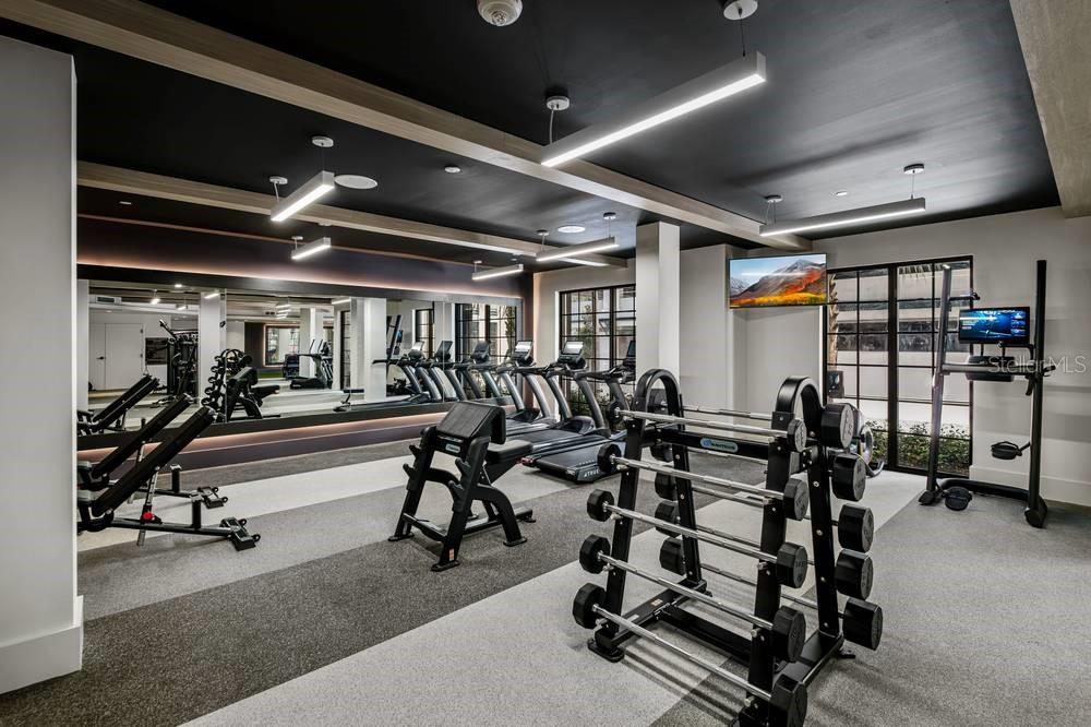901 West Chestnut Street, Unit B507 Tampa, FL 33607 - Photo 18 of 20 a view of a room with gym equipment