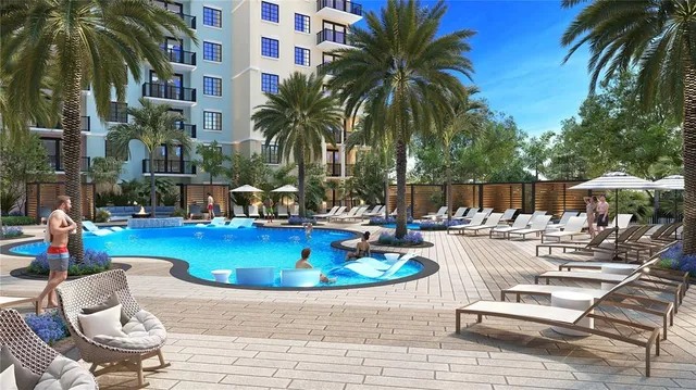 a view of swimming pool with outdoor seating