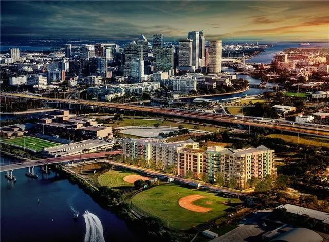 an aerial view of residential houses with outdoor space