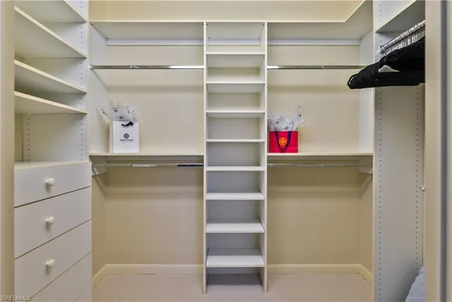 a storage room with a wooden floor