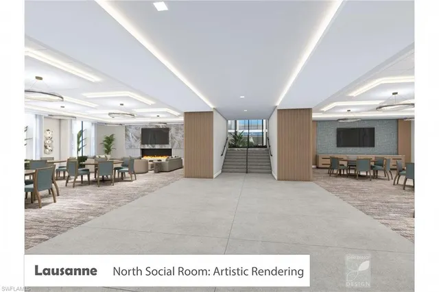 a living room with stainless steel appliances kitchen island granite countertop a table and chairs in it