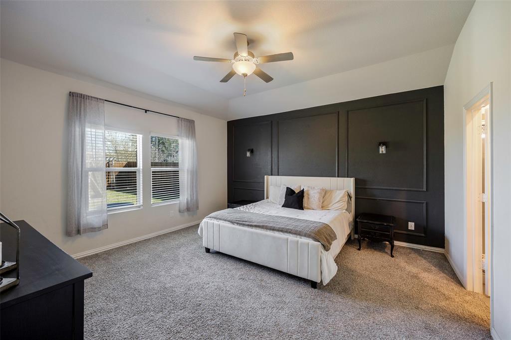 307 Quarry Street Melissa, TX 75454 - Photo 12 of 25 a bedroom with a bed and window