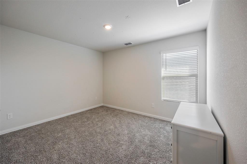 307 Quarry Street Melissa, TX 75454 - Photo 23 of 25 a room with a window and washer