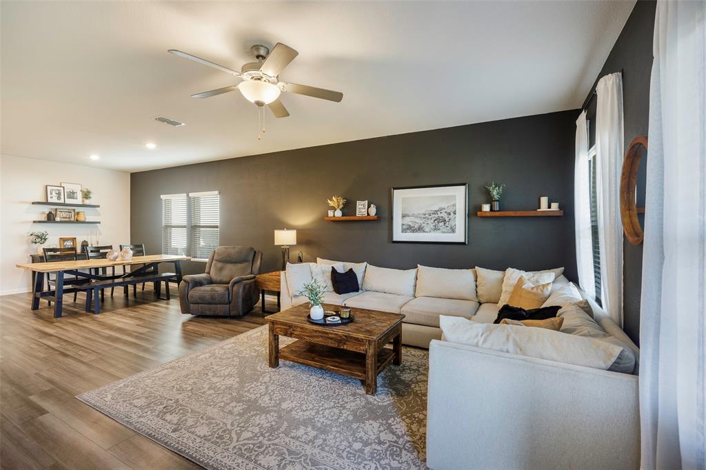 307 Quarry Street Melissa, TX 75454 - Photo 9 of 25 a living room with furniture and wooden floor