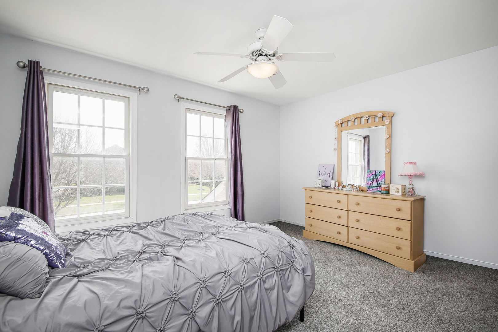 3807 Landsdown Avenue Naperville, IL 60564 - Photo 16 of 29 a bedroom with a bed and a dresser