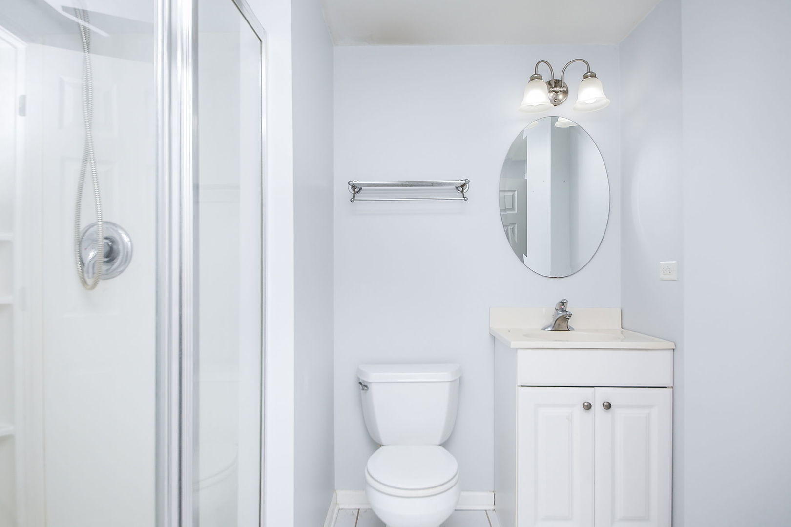 3807 Landsdown Avenue Naperville, IL 60564 - Photo 21 of 29 a bathroom with a sink a toilet and a mirror