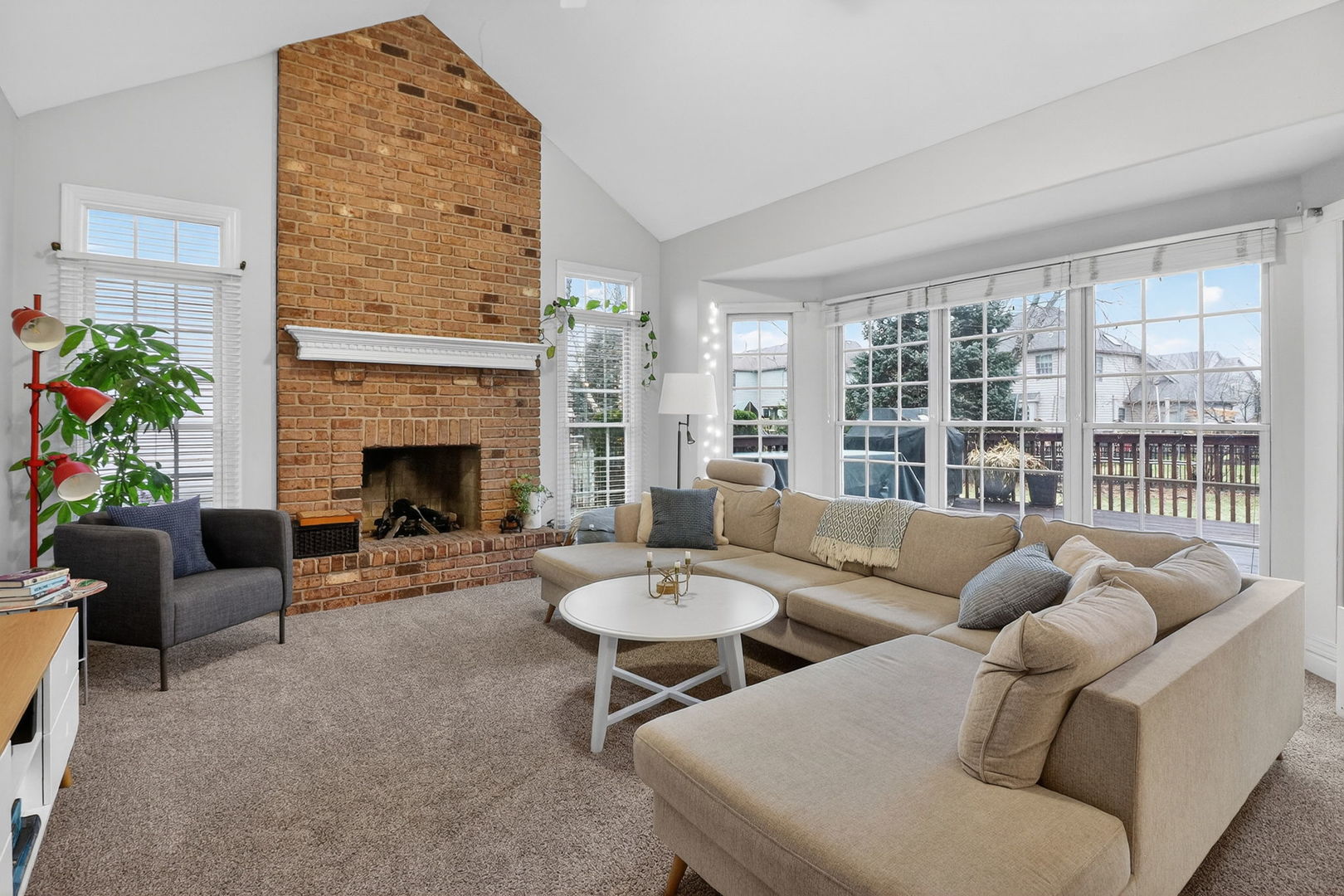 3807 Landsdown Avenue Naperville, IL 60564 - Photo 8 of 29 a living room with furniture and a fireplace