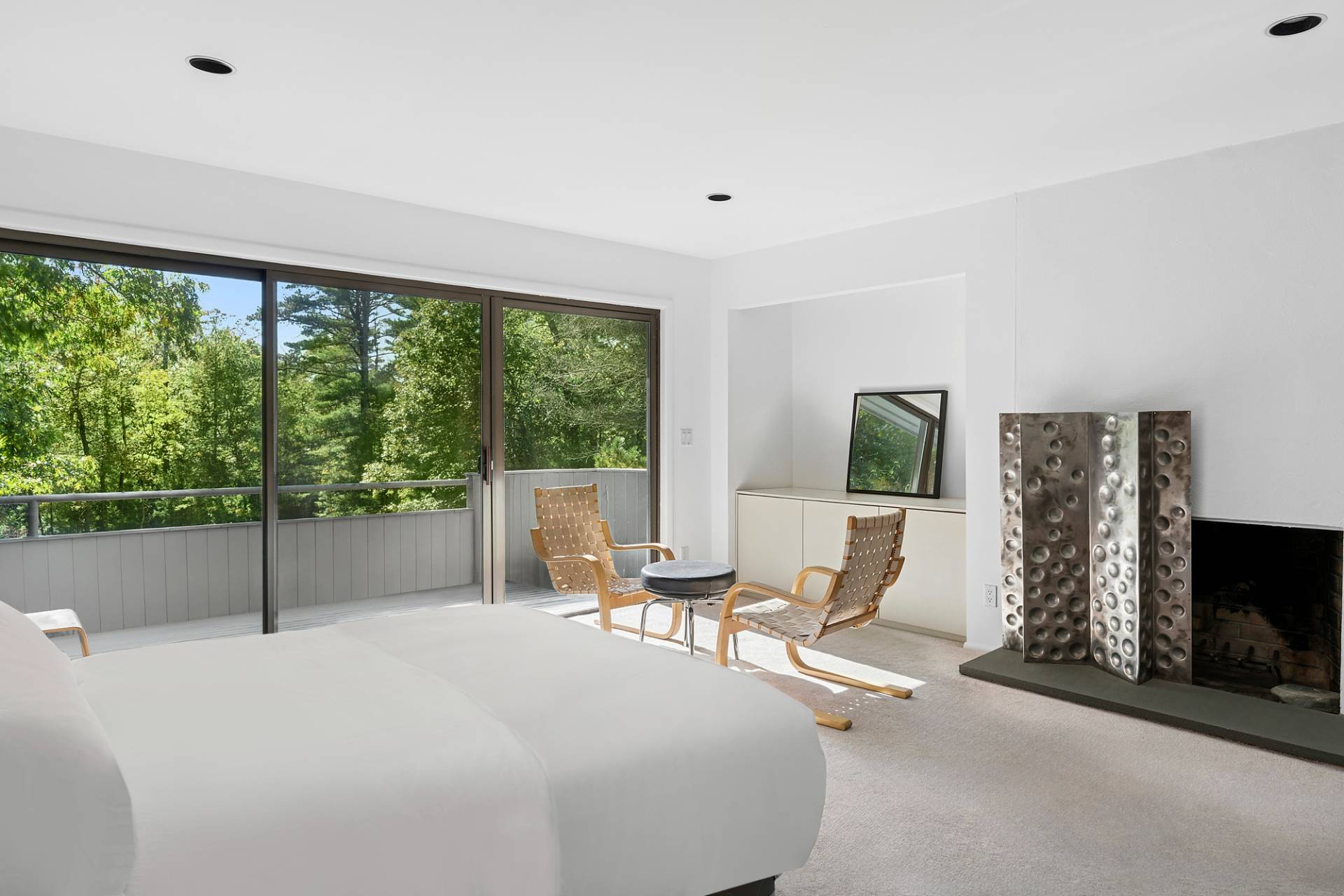 15 2 Holes Water Road East Hampton, NY 11937 - Photo 13 of 30 a bedroom with a bed and large window
