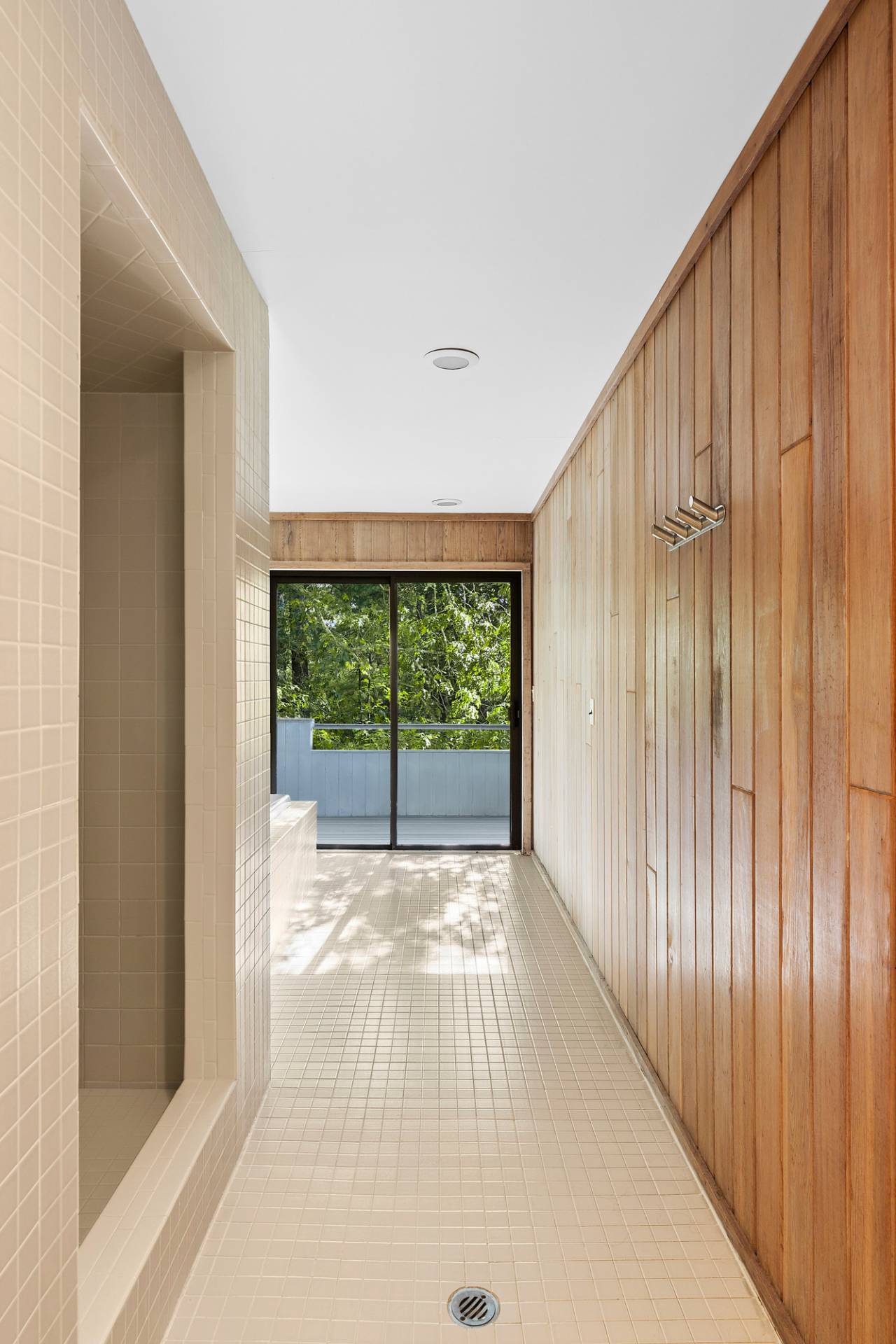 15 2 Holes Water Road East Hampton, NY 11937 - Photo 14 of 30 a view of an empty room with wooden floor and a window