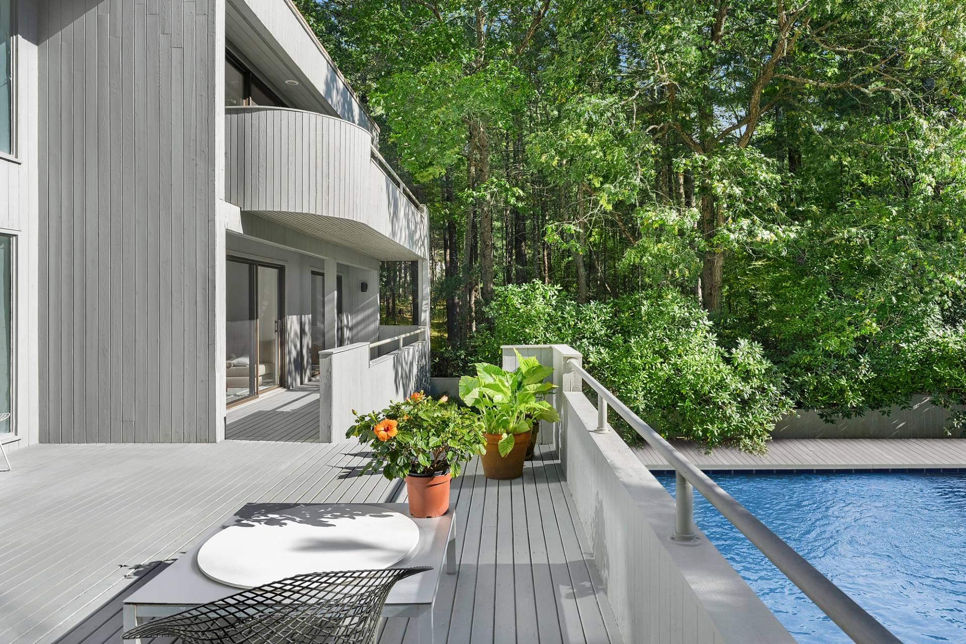 15 2 Holes Water Road East Hampton, NY 11937 - Photo 20 of 30 a view of a chair and table in the balcony