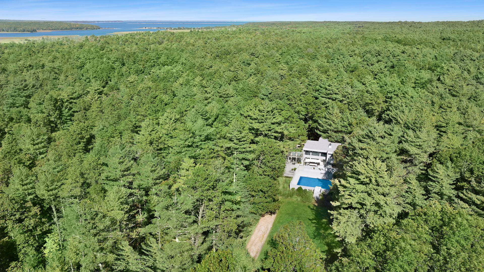 15 2 Holes Water Road East Hampton, NY 11937 - Photo 30 of 30 a view of a lush green field with a tree